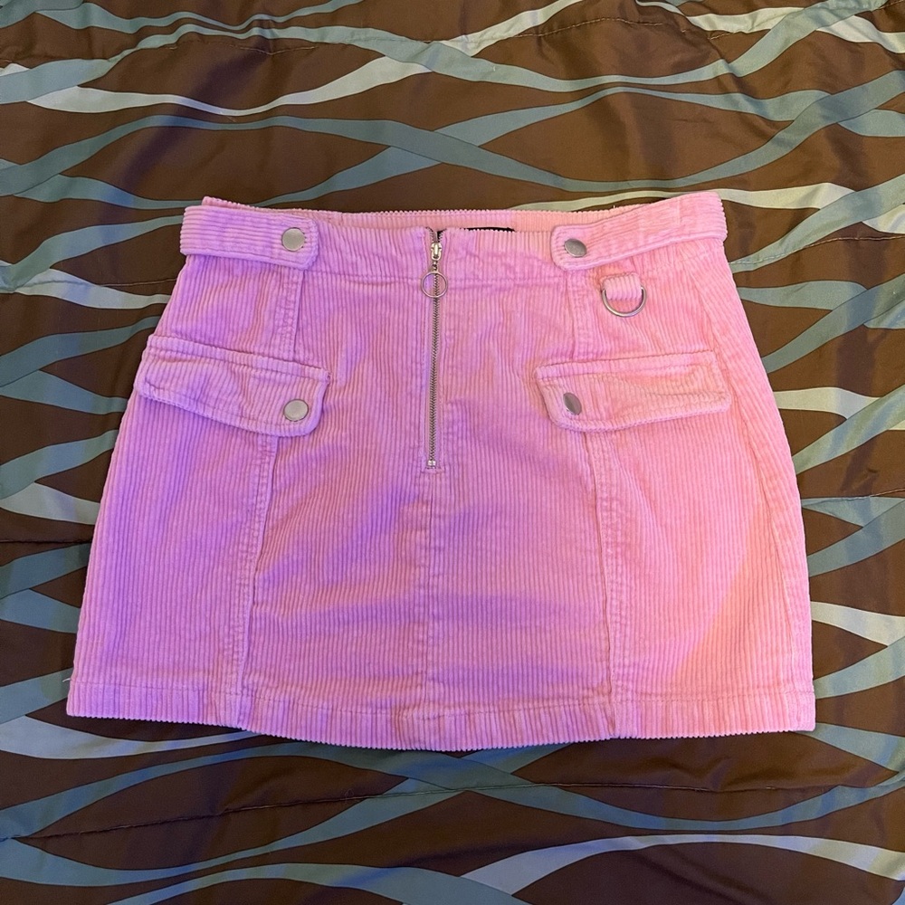 Hot pink skirt.